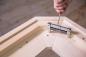 Preview: Maxifix mitre clamp - the small super clamp | join frames, door panels, cornices etc. quickly and easily | high clamping force despite small size | specially hardened and replaceable compass tips